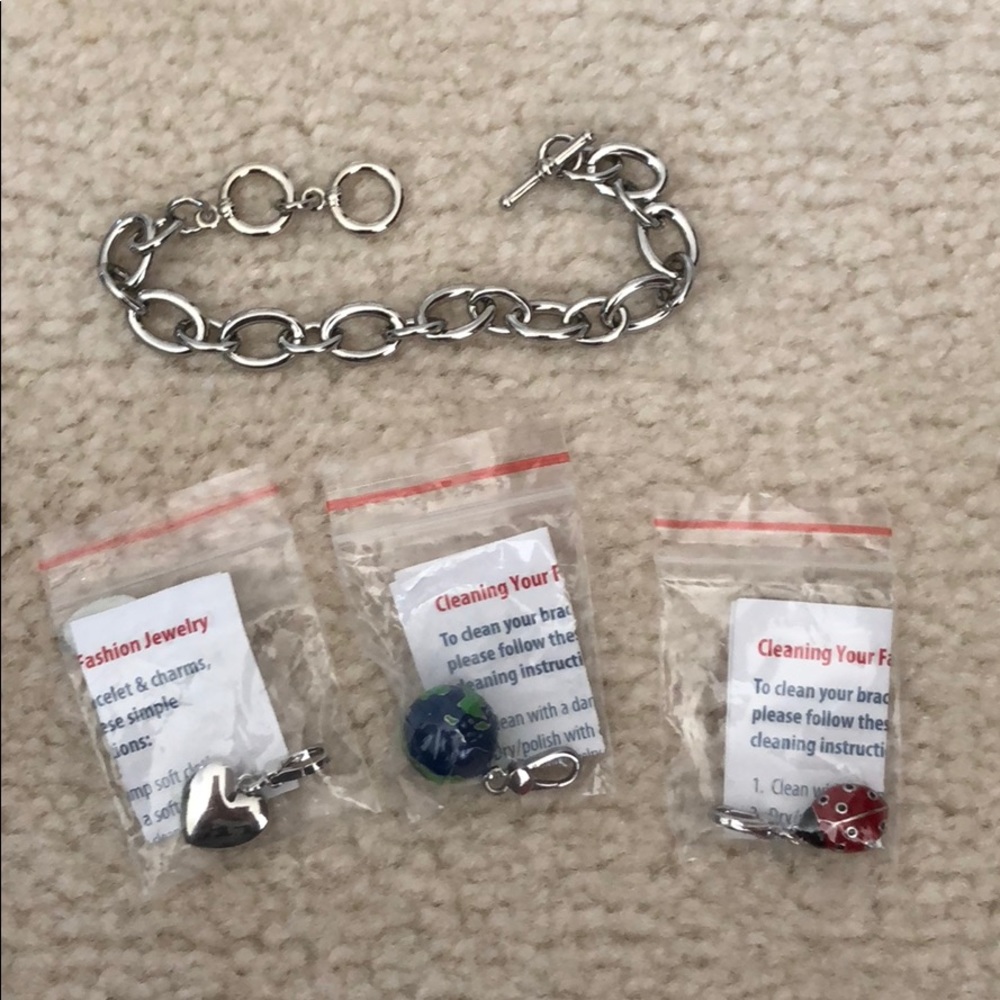Silver tone charm bracelet